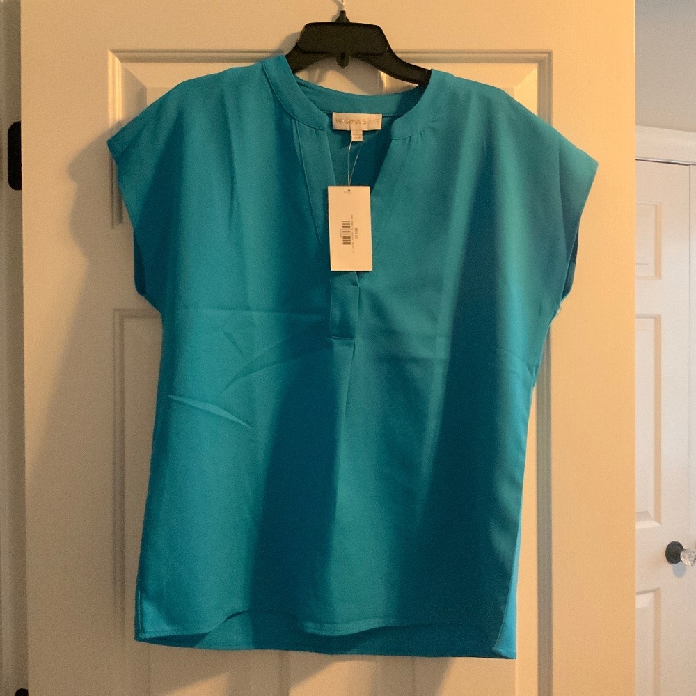Turquoise blue top in size Large